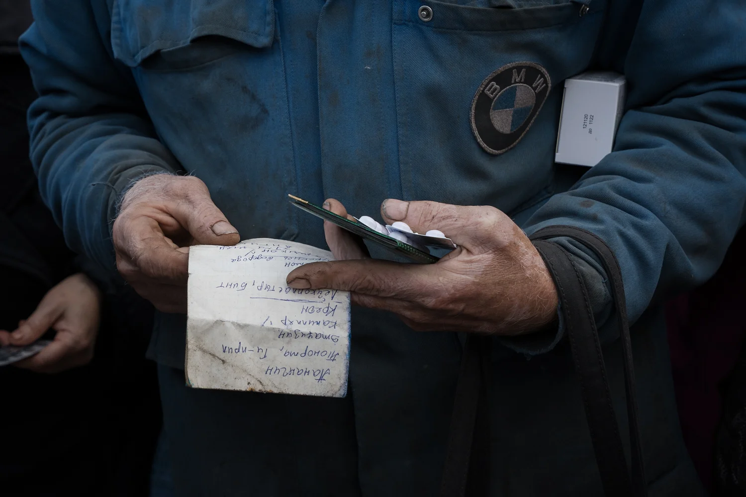Personne venant chercher ses médicaments, Izium, Ukraine
